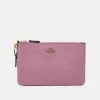 Buy 🥰 Coach SMALL WRISTLET - Other Accessories - Tulip 💯
