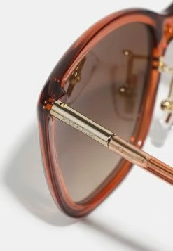 Best Sale 😉 Coach 👓 Sunglasses - Transparent Amber 🎉 -Coach Sales 82cdf0092a534315a61d3a8966bc994c