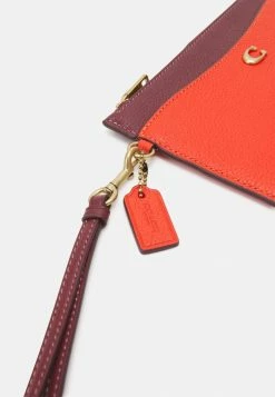Brand new 🛒 Coach COLORBLOCK ZIP WRISTLET - Wallet - Red Orange Multi 👍 -Coach Sales a6bc65147e0244a0a7eafa164d83f60d