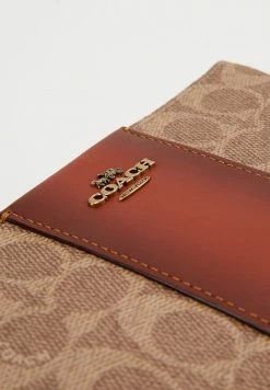 Cheap 🔥 Coach 🧥 COATED SMALL WRISTLET - Wallet - Tan Rust 💯 -Coach Sales a73237a27cd24def90fefa8b1d871054