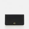 Buy 🔔 Coach SLIM TRAVEL WALLET - Wallet - Black 😀