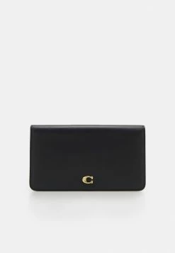 Buy 🔔 Coach SLIM TRAVEL WALLET - Wallet - Black 😀