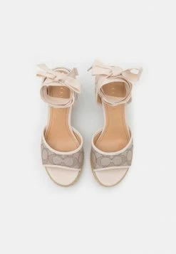 Buy 🌟 Coach PAGE WEDGE - Platform 🩴 Sandals - Stone/chalk ✨ -Coach Sales e4a47a7daa8d42b98498c44cc758843e